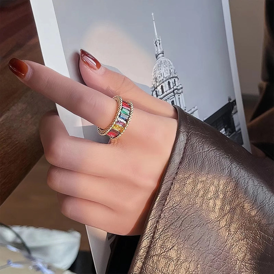 Sparkling zirconia rainbow ring with index finger