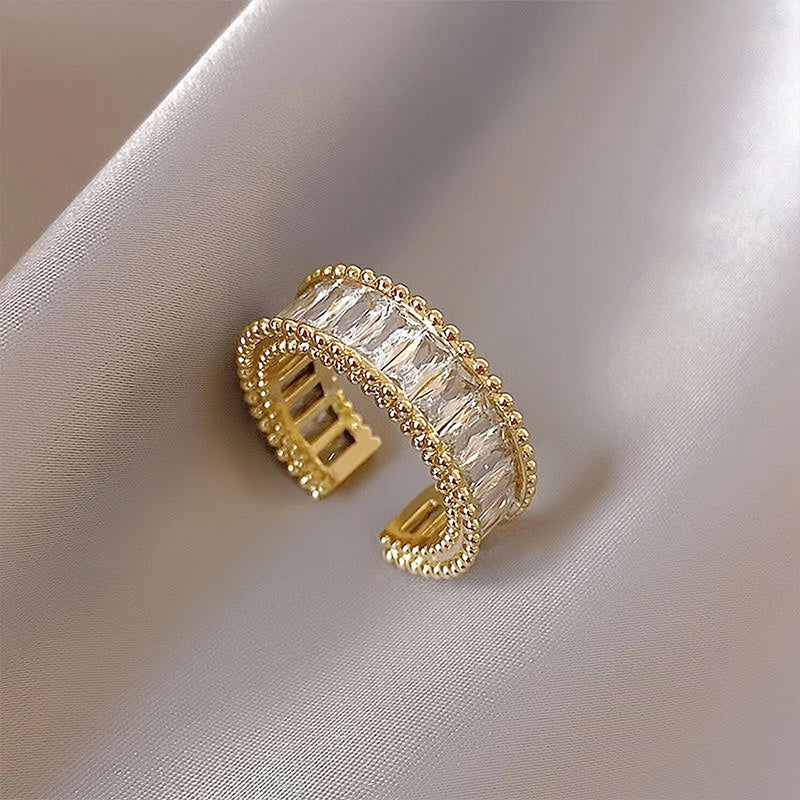 Sparkling zirconia rainbow ring with index finger