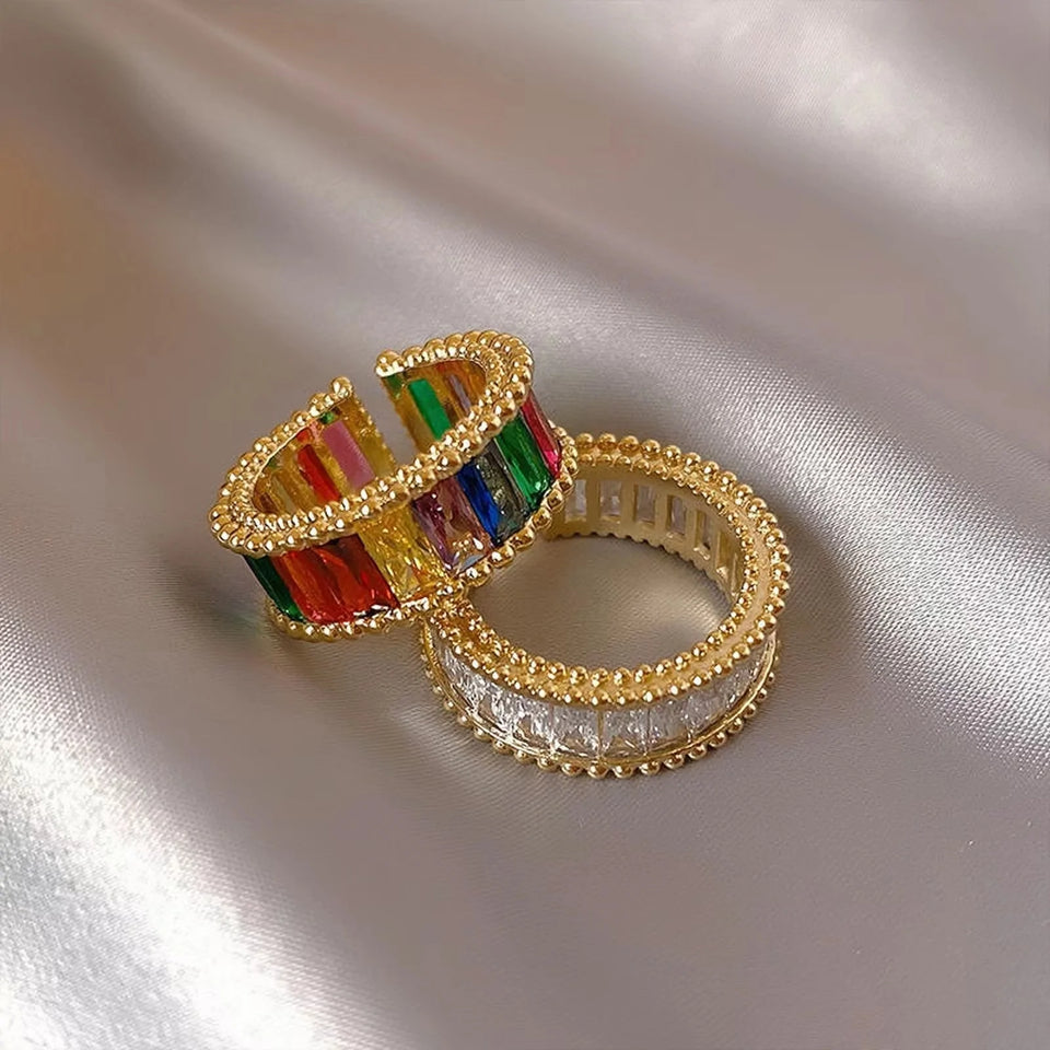 Sparkling zirconia rainbow ring with index finger